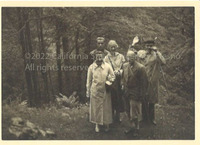 Front, Madden posing with four persons, July 1936